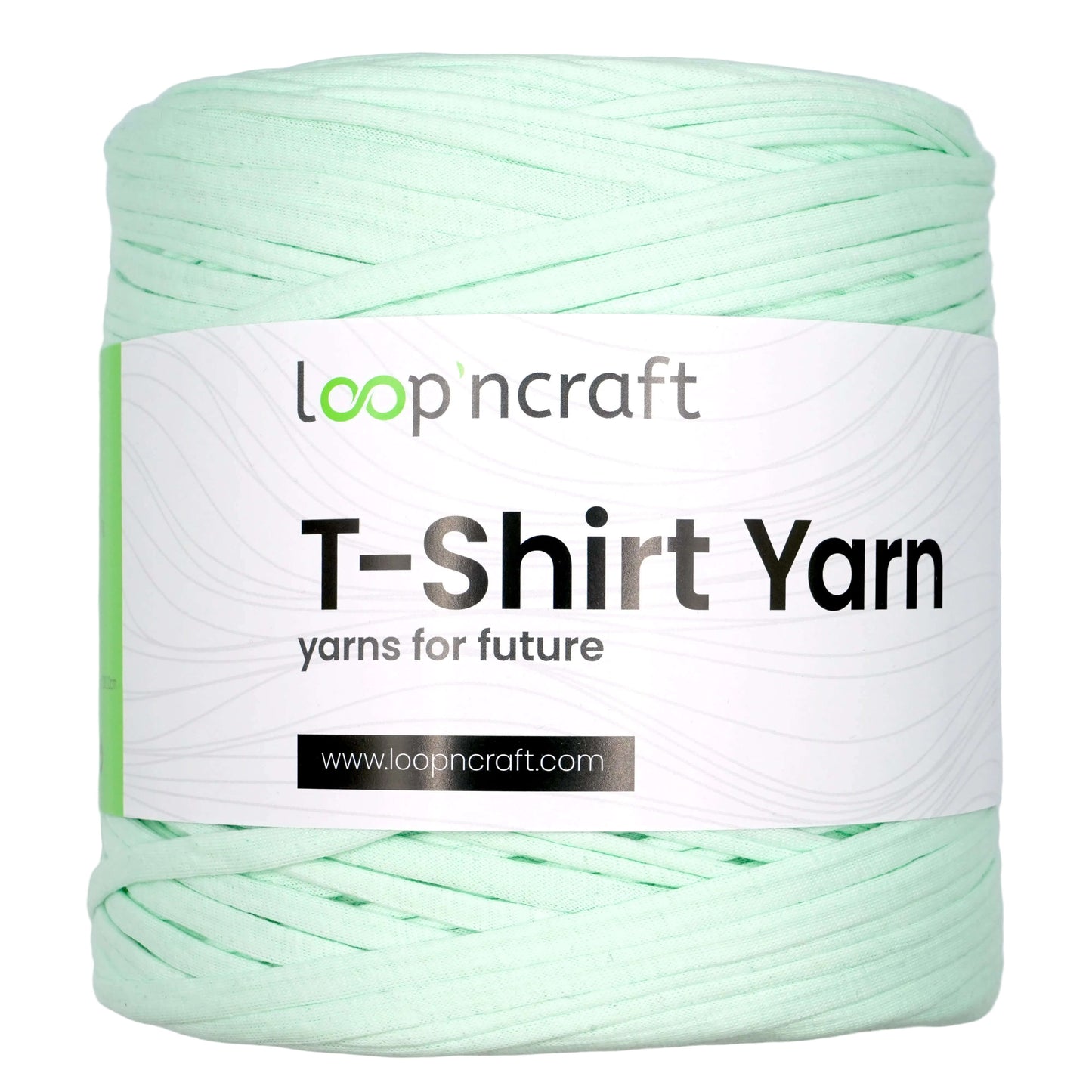A spool of Loopncraft T-Shirt Yarn in a pale mint green color, featuring a white paper label with the brand name 'loopncraft' and product details.