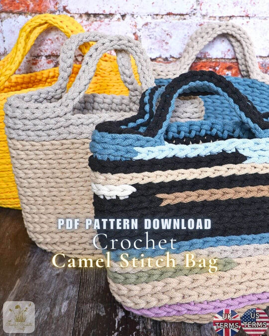 Three crocheted camel stitch tote bags shown in different colorways, with a rustic brick and wood background. The front bag is blue, black, beige, and white striped, with text overlay reading 'PDF PATTERN DOWNLOAD Crochet Camel Stitch Bag'.