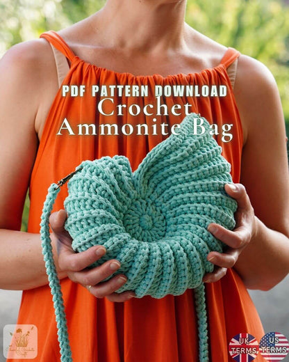 A woman in an orange dress holds a mint green crocheted ammonite bag. The image features text overlays reading 'PDF PATTERN DOWNLOAD Crochet Ammonite Bag' and a 'BEE KNUCKLES' logo in the bottom right corner.