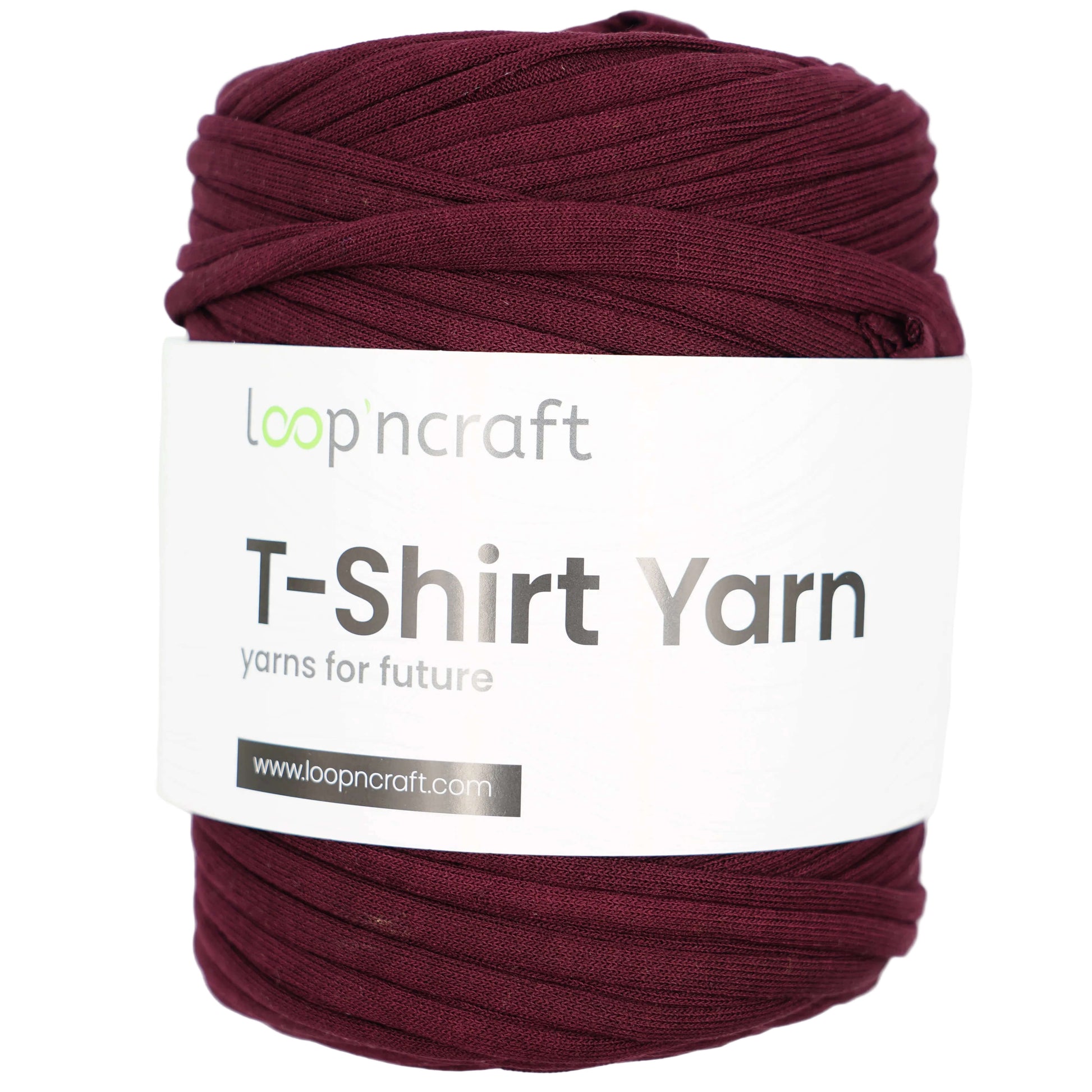 A skein of Loopncraft T-Shirt Yarn in a deep burgundy color, wrapped with a white paper label that reads 'loopncraft T-Shirt Yarn'.