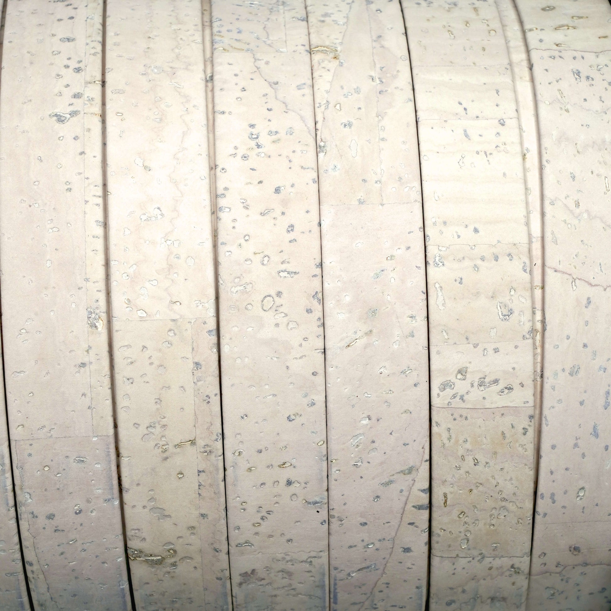 Close-up of a textured white surface with horizontal lines