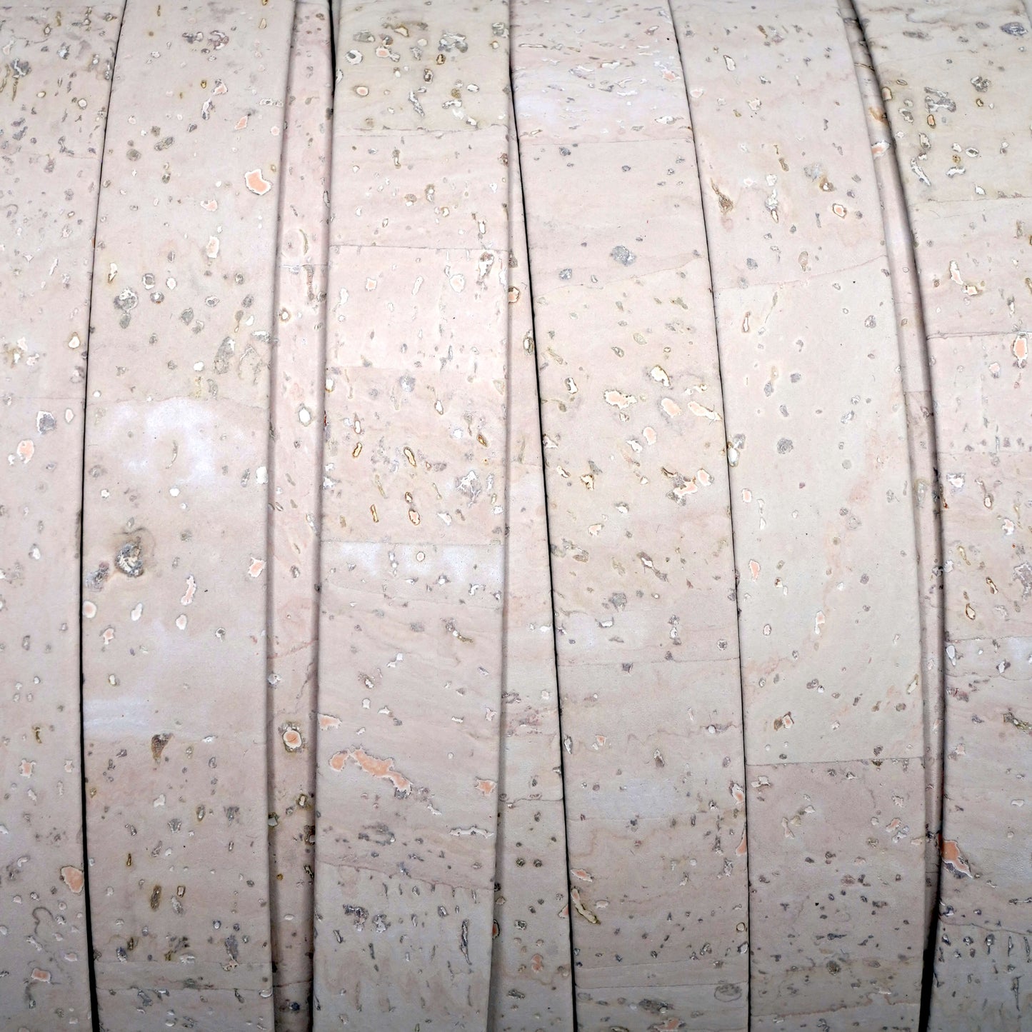 Close-up of a spool of cable with a textured surface