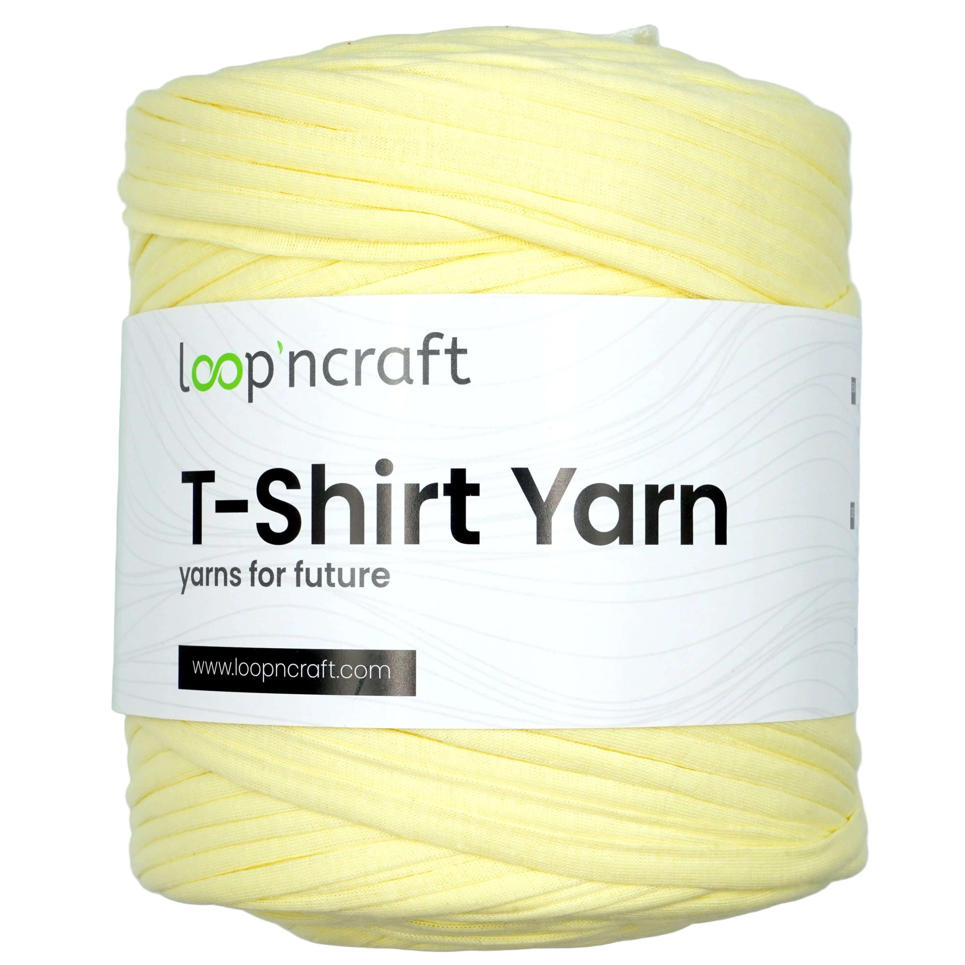 A skein of pale yellow T-shirt yarn with a white paper label that reads 'loopncraft T-Shirt Yarn' on a light gray background.