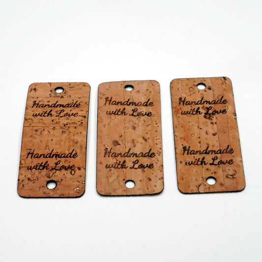 Three wooden tags with 'Handmade with Love' text on a white background
