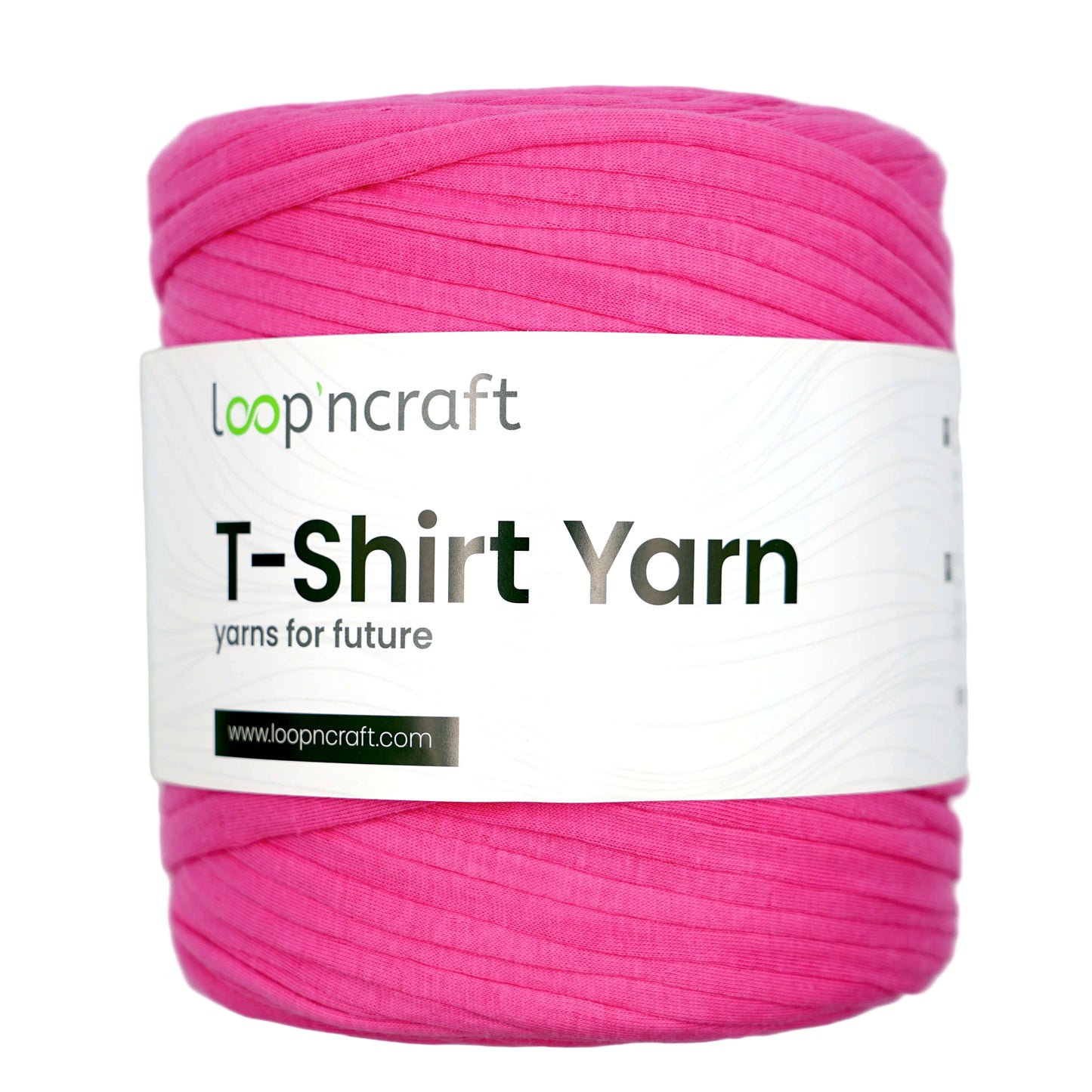 A skein of bright pink T-shirt yarn wrapped with a white paper label that reads 'loopncraft T-Shirt Yarn' on a light gray background.