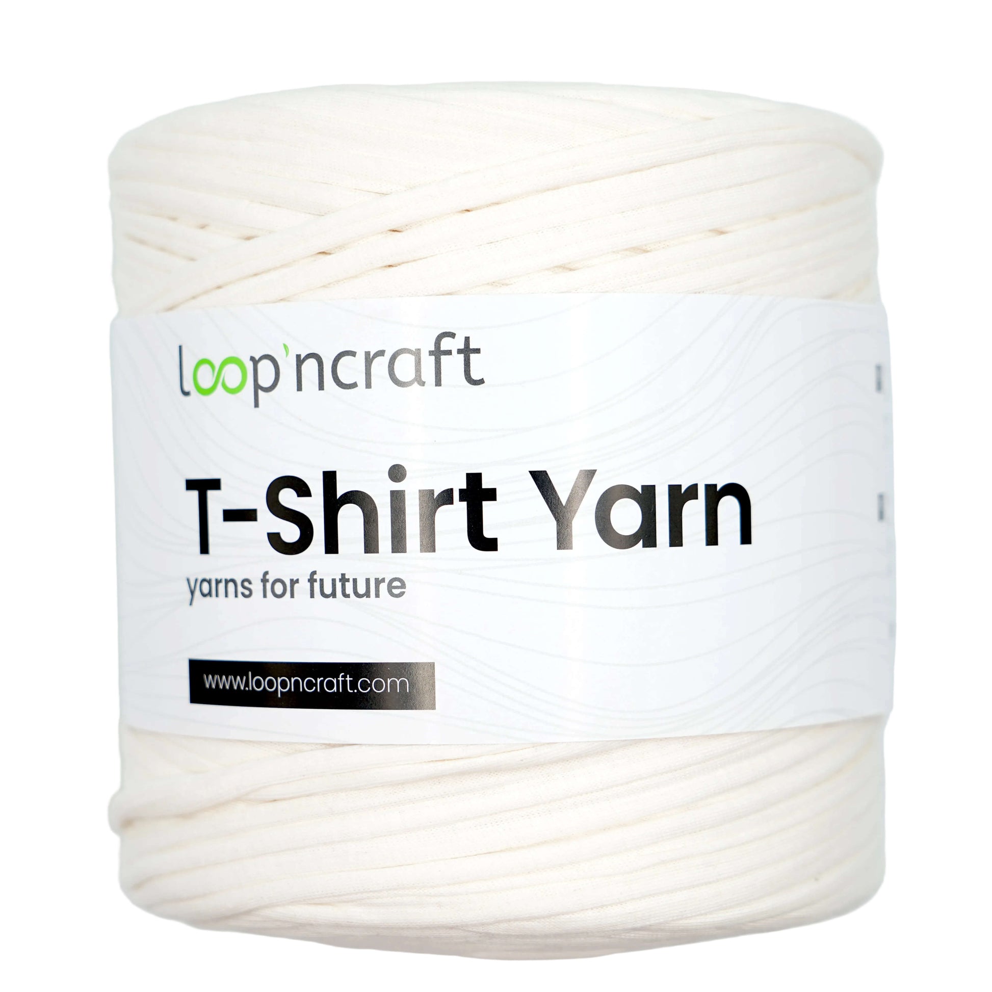 A spool of off-white T-shirt yarn with a white paper label that reads 'loop'n craft T-Shirt Yarn' on a light gray background.